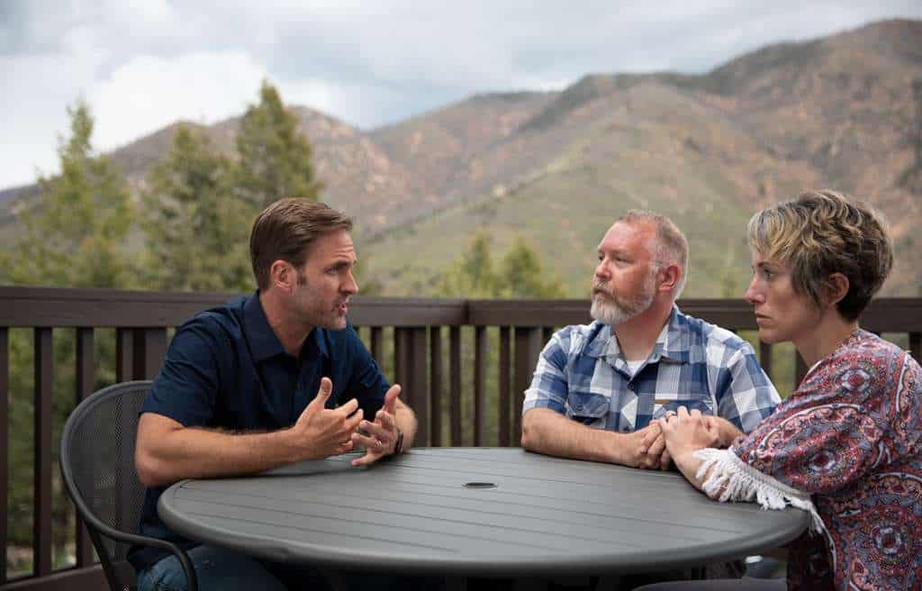 Family therapy session at Sandstone Care residential treatment center with mountain views in Colorado