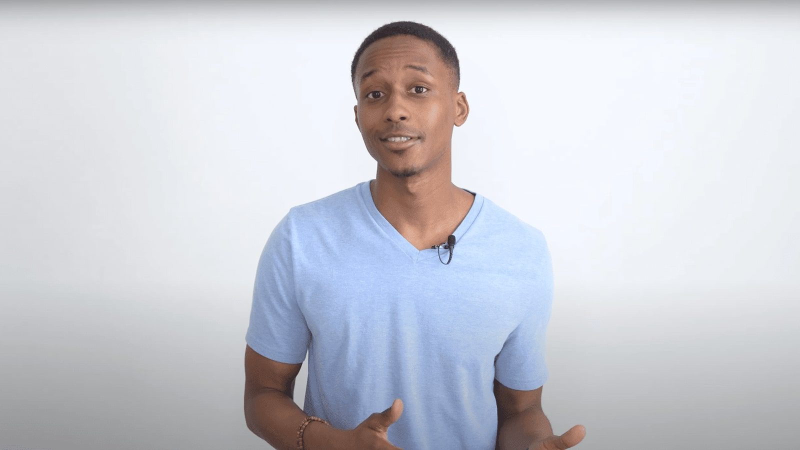 arafed man in a blue shirt is making a funny face