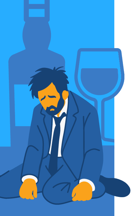 there is a man sitting on the floor with a glass of wine