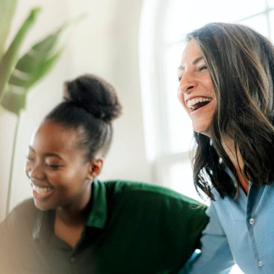 people smiling in group therapy