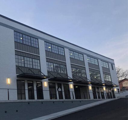 arafed building with a clock on the front of it