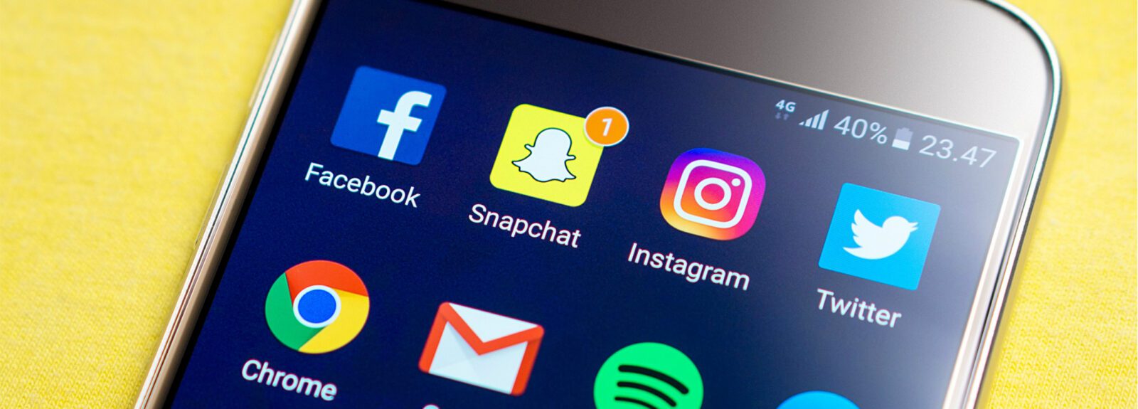 a close up of a cell phone with various apps on it