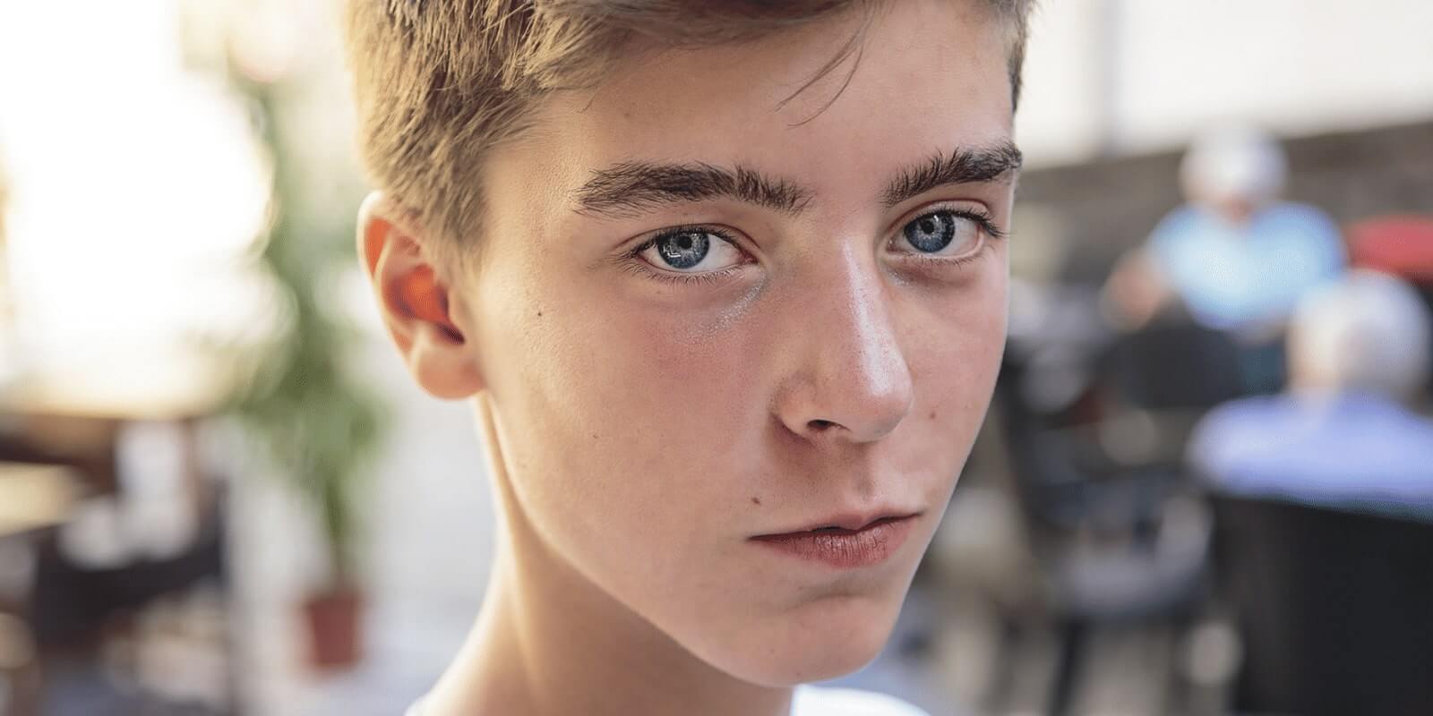 there is a young man with a white shirt and a tie