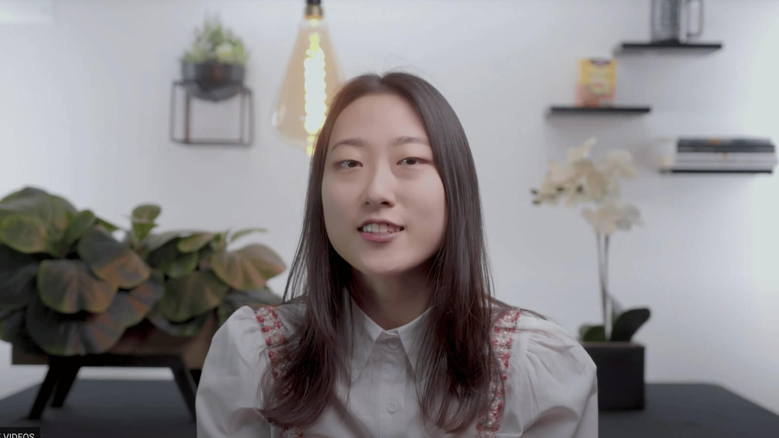 An asian female smiling