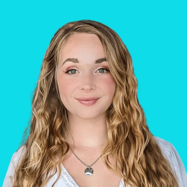 arafed woman with long blonde hair and a necklace on