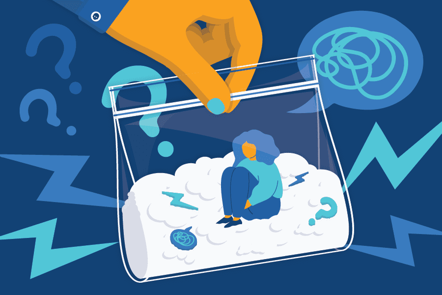 someone is holding a glass with a small bird inside of it